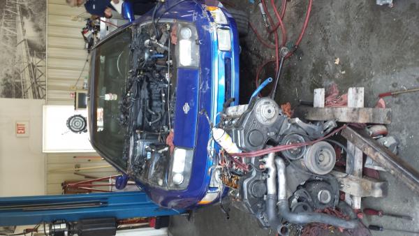 Getting an engine swap. Got the old one out!