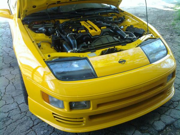 Engine bay after refinishing the cowl and wipers and adding the custom 300zx burger on the front panel