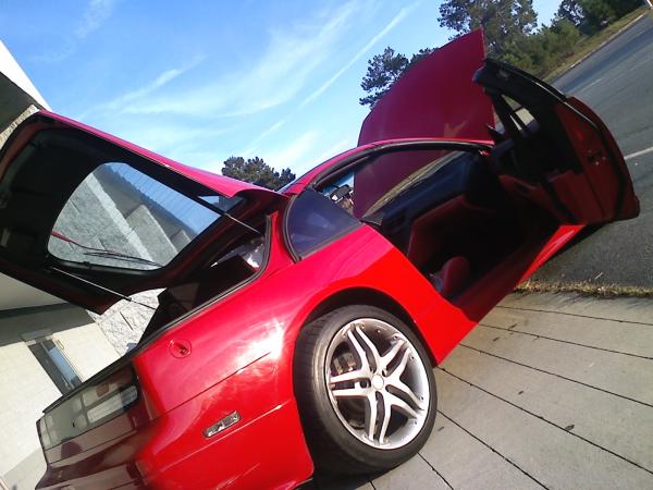 Old pic Oct 09 last shoot with the Momo rims and red interior. 18 by 10 1/2 in the rear 18 by 8 1/2 in the front.