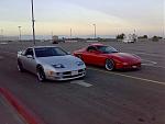 My cousins FD and my Z.  It was his FD that made me buy a 90s sports car.  This is right after I bought my wheels and she was stock.