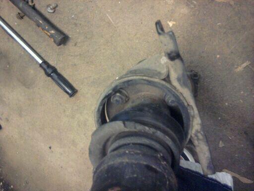 the busted driveshaft carrier bearing completely GONE!